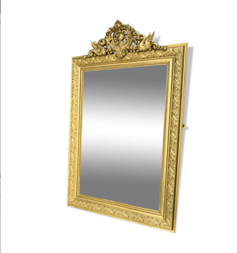 miroir biseauté avec moulures dorées