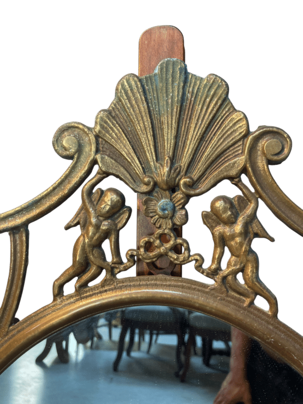 miroir ovale laiton chérubins et moulures
