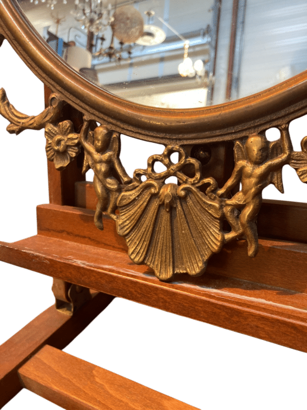 miroir ovale laiton chérubins et moulures