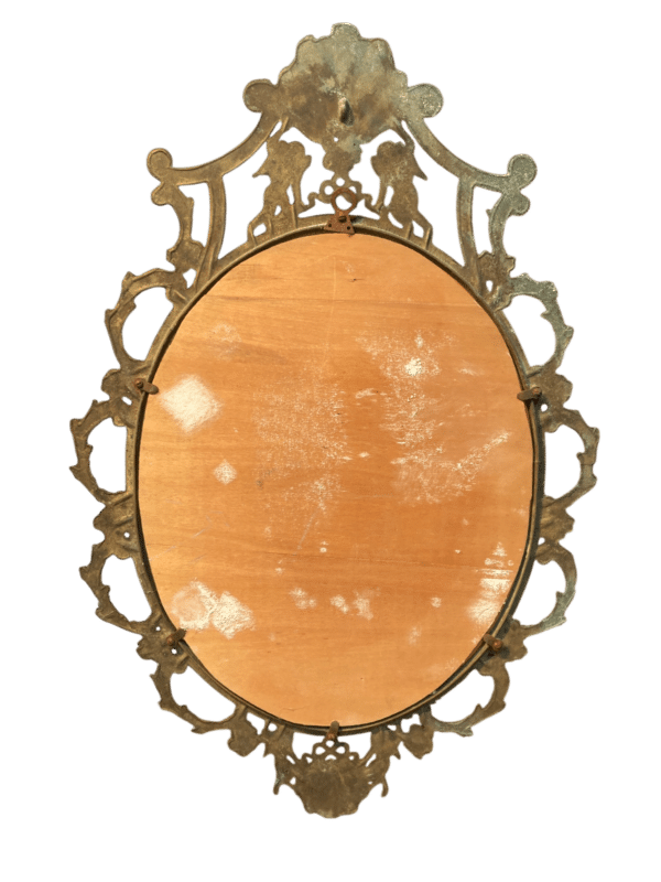 miroir ovale laiton chérubins et moulures